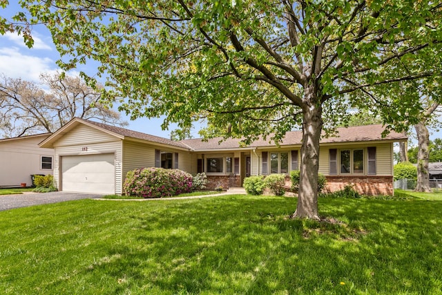 112 Braemar Dr, Elk Grove Village, IL 60007 - ranch-style home with driveway, a garage, brick siding, and a front yard