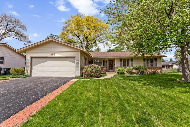 112 Braemar Dr, Elk Grove Village, IL 60007 - ranch-style house with an attached garage, driveway, and a front lawn