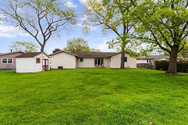 112 Braemar Dr, Elk Grove Village, IL 60007 - rear view of property featuring a shed and an outdoor structure