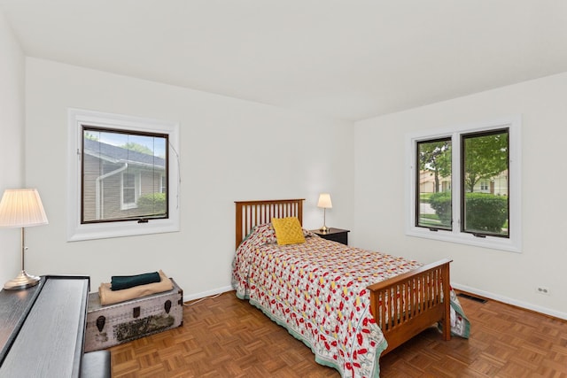 112 Braemar Dr, Elk Grove Village, IL 60007 - bedroom with multiple windows and baseboards