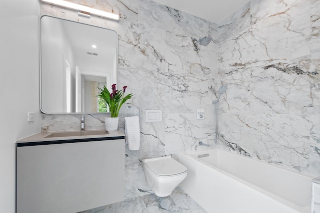 full bath featuring toilet, vanity, marble finish floors, and bathing tub / shower combination