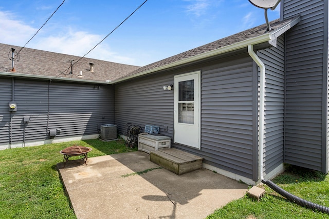 2717 E Main St, Decatur, IL 62521 - view of patio featuring a fire pit and central air condition unit