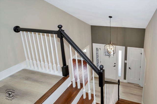 2639 E Shady Grove Ct, Crete, IL 60417 - stairs featuring wood finished floors, a chandelier, and baseboards