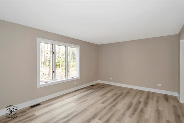 2639 E Shady Grove Ct, Crete, IL 60417 - empty room with light wood-style flooring and baseboards