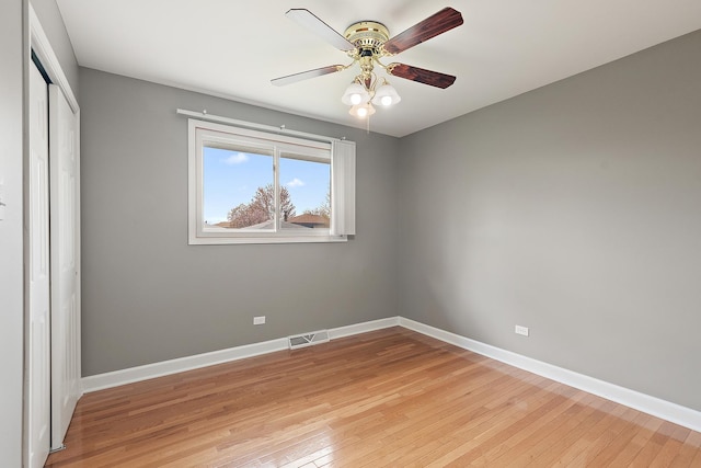 6407 182nd St, Tinley Park, IL 60477 - unfurnished bedroom featuring light wood-style floors, a closet, baseboards, and ceiling fan