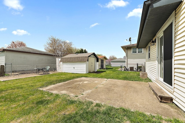 6407 182nd St, Tinley Park, IL 60477 - view of yard featuring a patio, a storage unit, and an outbuilding