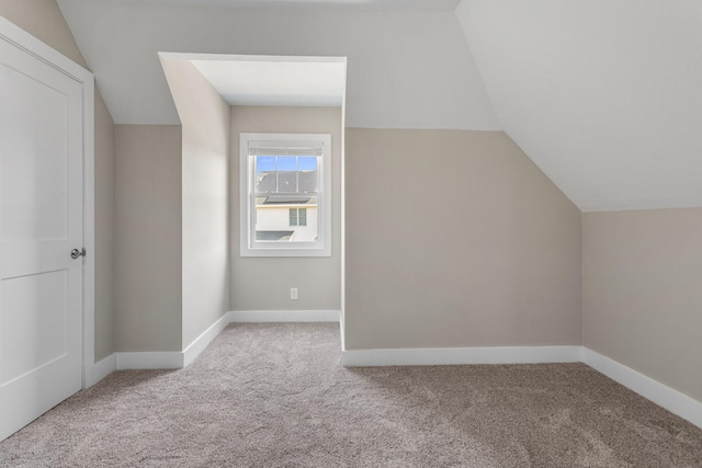 2012 Spruce Ln, Monticello, IL 61856 - bonus room featuring carpet, lofted ceiling, and baseboards