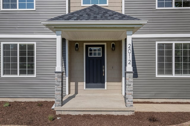 2012 Spruce Ln, Monticello, IL 61856 - entrance to property with covered porch and roof with shingles