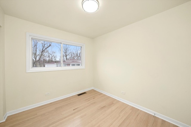 236 Early St, Park Forest, IL 60466 - unfurnished room with baseboards and light wood-style flooring