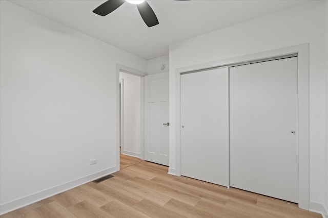 1416 3rd St, Winthrop Harbor, IL 60096 - unfurnished bedroom featuring light wood-type flooring, a ceiling fan, and a closet