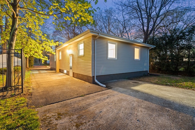1416 3rd St, Winthrop Harbor, IL 60096 - property exterior at dusk featuring fence