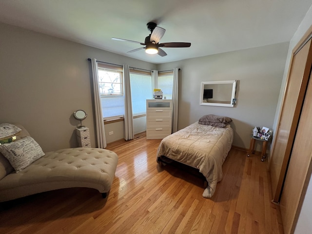 7700 Le Claire Ave, Skokie, IL 60077 - bedroom featuring light wood-style flooring, baseboards, and ceiling fan