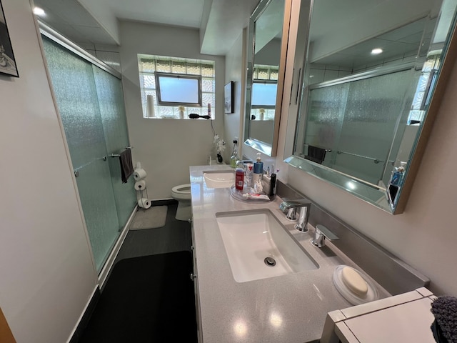 7700 Le Claire Ave, Skokie, IL 60077 - bathroom featuring toilet, a stall shower, vanity, and baseboards