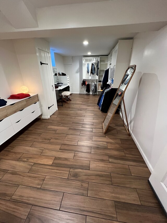 7700 Le Claire Ave, Skokie, IL 60077 - exercise area with dark wood finished floors, baseboards, and recessed lighting