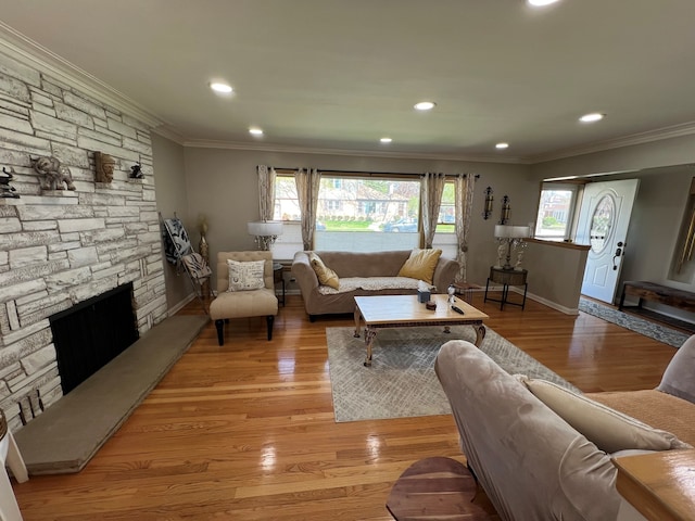 7700 Le Claire Ave, Skokie, IL 60077 - living area with crown molding, light wood-style floors, baseboards, a fireplace, and recessed lighting