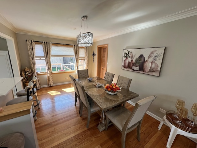 7700 Le Claire Ave, Skokie, IL 60077 - dining area featuring crown molding, light wood finished floors, and baseboards