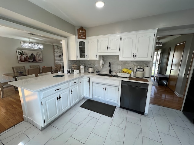 7700 Le Claire Ave, Skokie, IL 60077 - kitchen with dishwasher, a sink, light countertops, light marble finish flooring, and recessed lighting