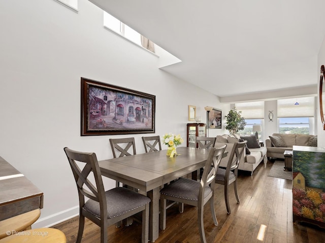 400 Mccarthy Rd Unit 416, Lemont, IL 60439 - dining area featuring dark wood-type flooring and baseboards