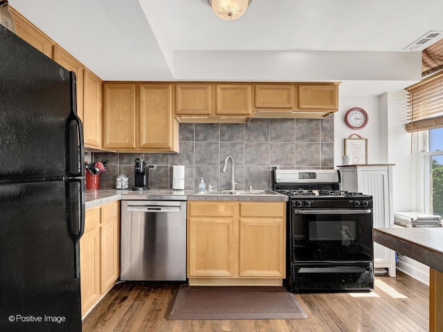 400 Mccarthy Rd Unit 416, Lemont, IL 60439 - kitchen featuring black appliances, hardwood / wood-style floors, tasteful backsplash, and light brown cabinetry