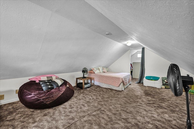 1216 N Oak St, Bloomington, IL 61701 - bedroom featuring a textured ceiling, vaulted ceiling, and carpet flooring