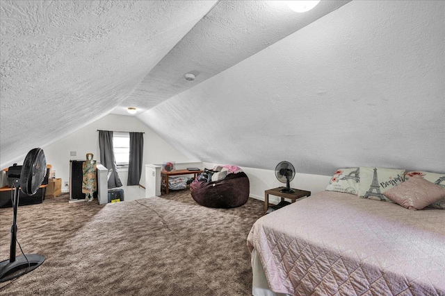1216 N Oak St, Bloomington, IL 61701 - carpeted bedroom with vaulted ceiling and a textured ceiling