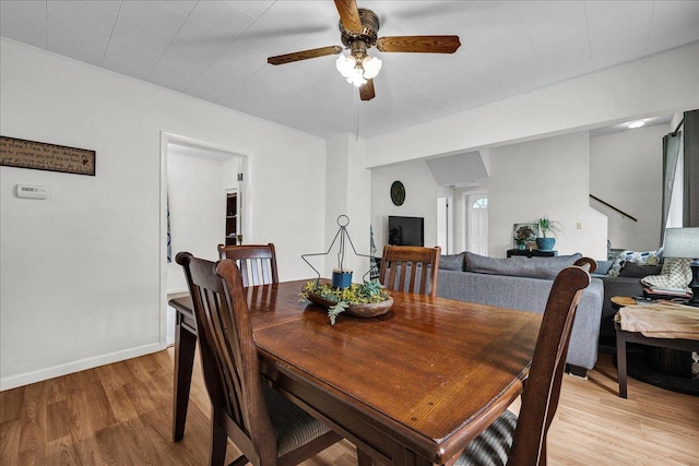 1216 N Oak St, Bloomington, IL 61701 - dining space featuring a ceiling fan and light wood-type flooring