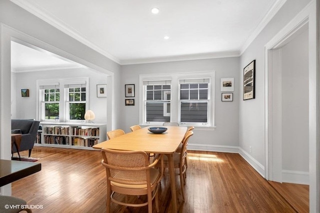 2206 Forestview Rd, Evanston, IL 60201 - dining space with wood finished floors, ornamental molding, baseboards, and recessed lighting