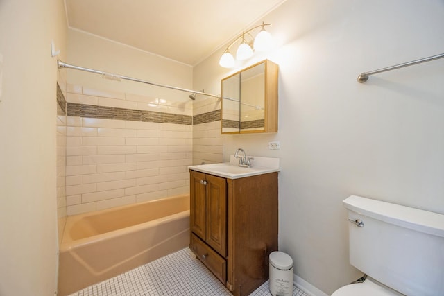 bathroom featuring tile patterned floors, toilet, bathtub / shower combination, and vanity