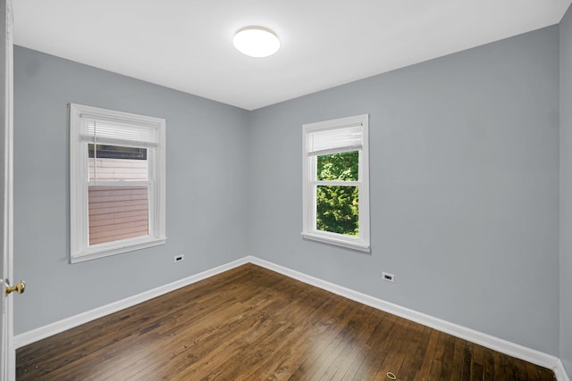 1513 Euclid Ave, Chicago Heights, IL 60411 - unfurnished room with baseboards and dark wood-style floors