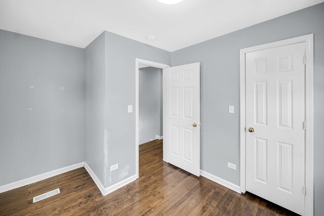 1513 Euclid Ave, Chicago Heights, IL 60411 - unfurnished bedroom featuring baseboards and wood finished floors
