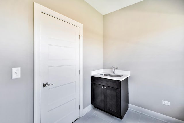 24465 S St Peters Dr, Channahon, IL 60410 - bathroom with baseboards, tile patterned floors, and vanity
