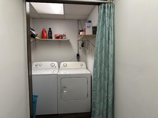laundry area with separate washer and dryer