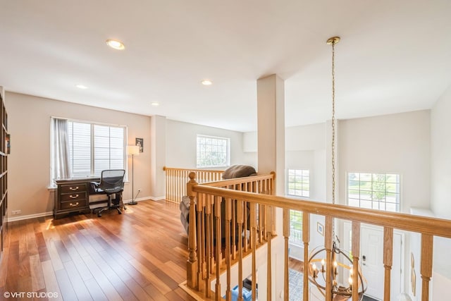 7181 Dada Dr, Gurnee, IL 60031 - corridor with an upstairs landing, wood finished floors, recessed lighting, and baseboards