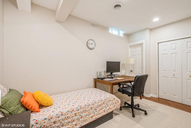 7181 Dada Dr, Gurnee, IL 60031 - bedroom featuring beamed ceiling, recessed lighting, a closet, wood finished floors, and baseboards