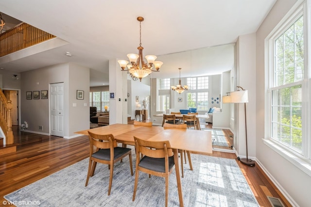 7181 Dada Dr, Gurnee, IL 60031 - dining space with a chandelier, healthy amount of natural light, and wood finished floors