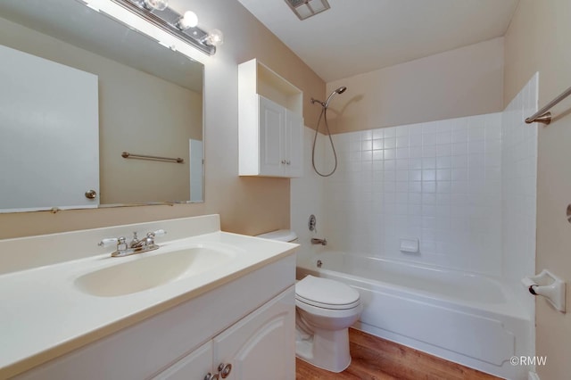 231 Barcliffe Ln Unit 231, Schaumburg, IL 60194 - full bathroom with toilet, tub / shower combination, wood finished floors, and vanity