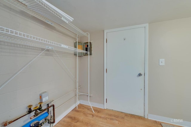231 Barcliffe Ln Unit 231, Schaumburg, IL 60194 - laundry area featuring wood finished floors and baseboards