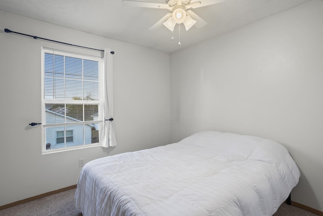 8 Harrison Ct, Bloomington, IL 61704 - bedroom with carpet flooring, baseboards, and ceiling fan