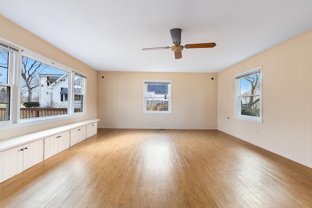 12217 S 68th Ct, Palos Heights, IL 60463 - spare room featuring light wood-style flooring and ceiling fan