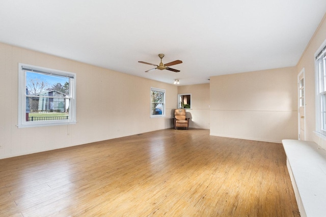 12217 S 68th Ct, Palos Heights, IL 60463 - empty room with light wood-type flooring and ceiling fan