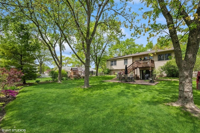 153 E Timberlane Dr, Palatine, IL 60067 - view of yard featuring stairs, a deck, and a patio