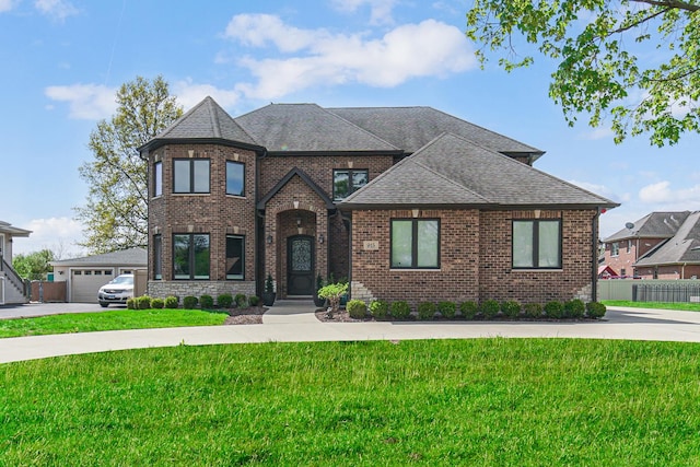 view of front of home with brick siding and a shingled roof