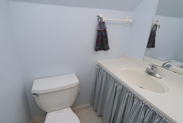 122 W Allen St, Ottawa, IL 61350 - bathroom with toilet, baseboards, and vanity