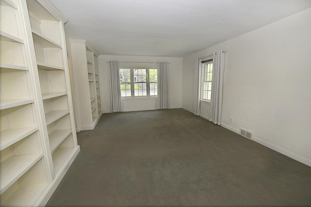 122 W Allen St, Ottawa, IL 61350 - empty room featuring dark carpet and baseboards