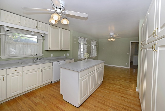 122 W Allen St, Ottawa, IL 61350 - kitchen with dishwasher, ceiling fan, a sink, and light wood-style flooring