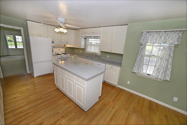 122 W Allen St, Ottawa, IL 61350 - kitchen featuring white appliances, a sink, white cabinetry, and baseboards