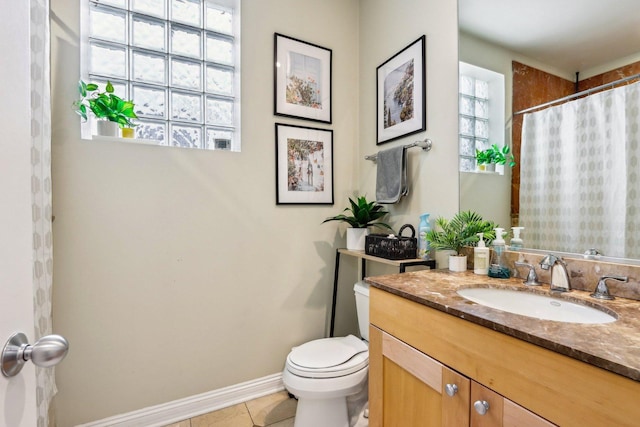 full bathroom with toilet, baseboards, vanity, tile patterned flooring, and a shower with curtain