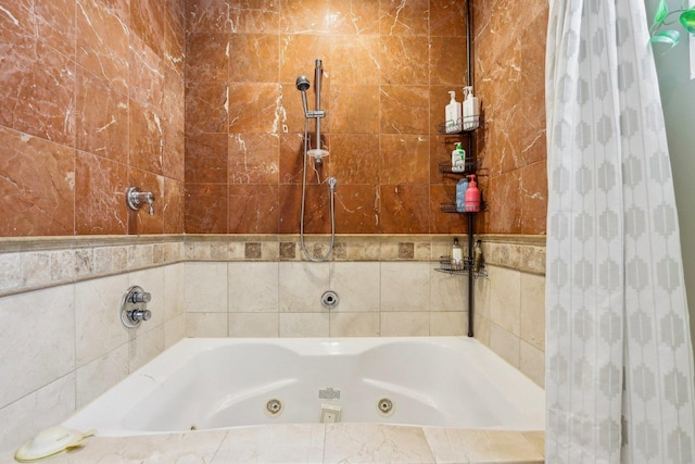 bathroom featuring a whirlpool tub and tiled shower