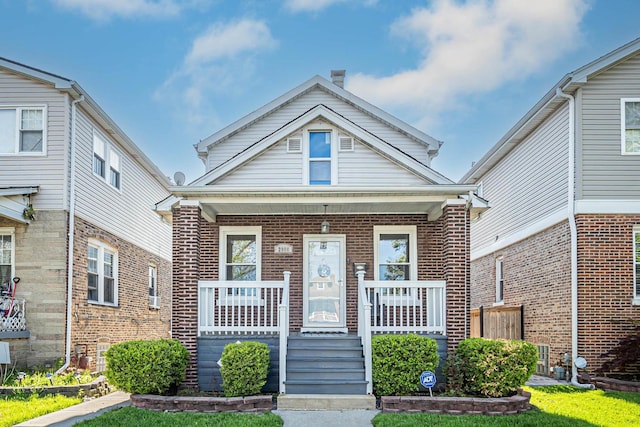 2906 N Menard Ave, Chicago, IL 60634 - view of front of home with covered porch and brick siding
