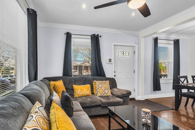 2906 N Menard Ave, Chicago, IL 60634 - living area featuring dark wood-style floors, a ceiling fan, crown molding, and baseboards